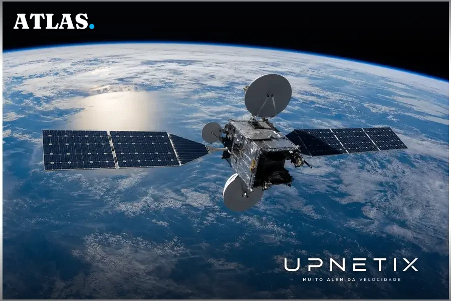 Satélite em órbita terrestre baixa transmitindo sinais de comunicação.