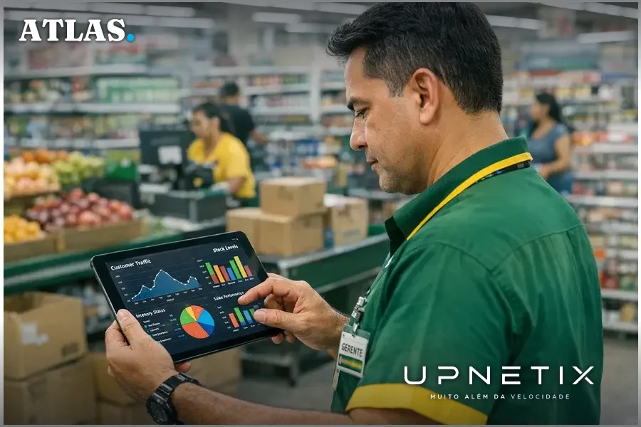 Gerente de supermercado em Manaus analisando dados em tablet enquanto supervisiona o salão de vendas.