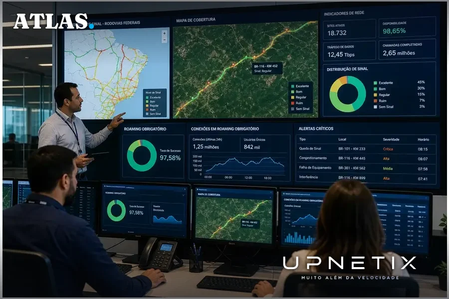 Técnicos de operadora analisando mapas digitais e dados de roaming obrigatório em rodovias federais